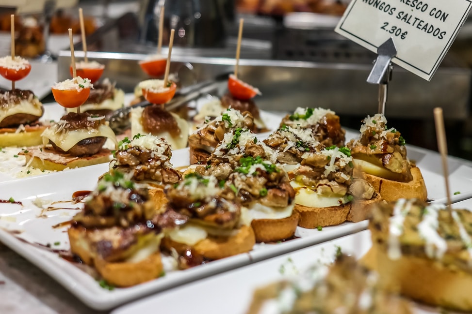 A lineup of pintxos in San Sebastian