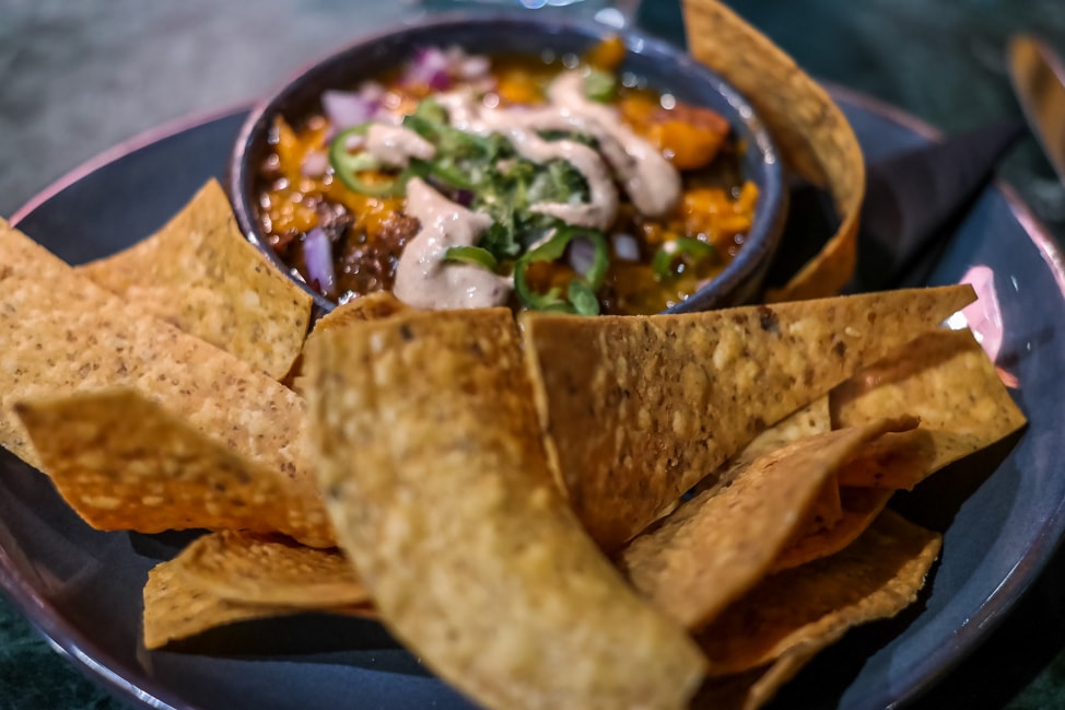 unique London restaurants: a snack of nachos at Temper in London's SoHo