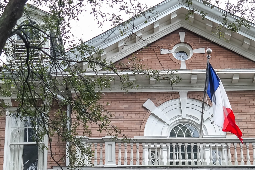 visit new orleans french flag