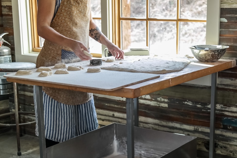 The best West Asheville breakfast: the kitchen staff shaping the doughnut dough