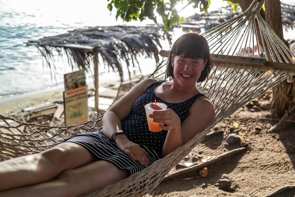 st. kitts best beaches julie relaxing at Shipwreck Bar with cocktail