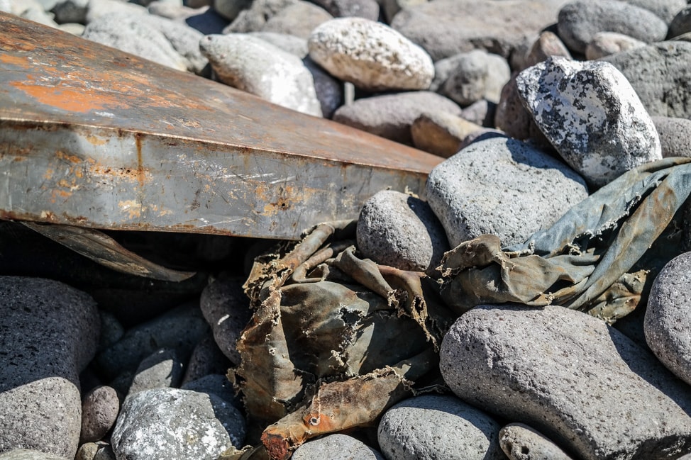 hiking in st. kitts the beach is strewn with stuff